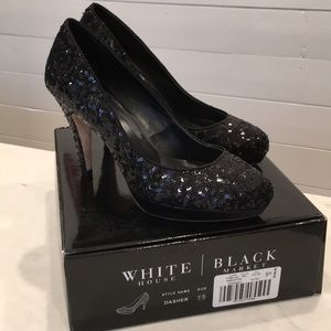 Black sequined party shoes.